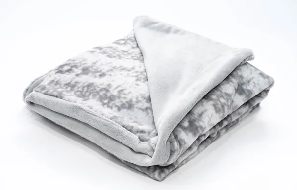 Tie-dyed grey faux fur blanket