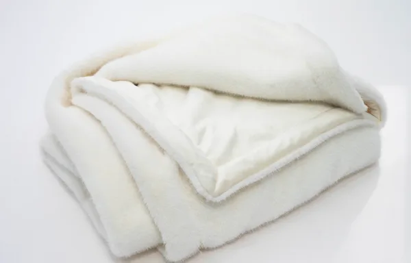 White faux fur blanket